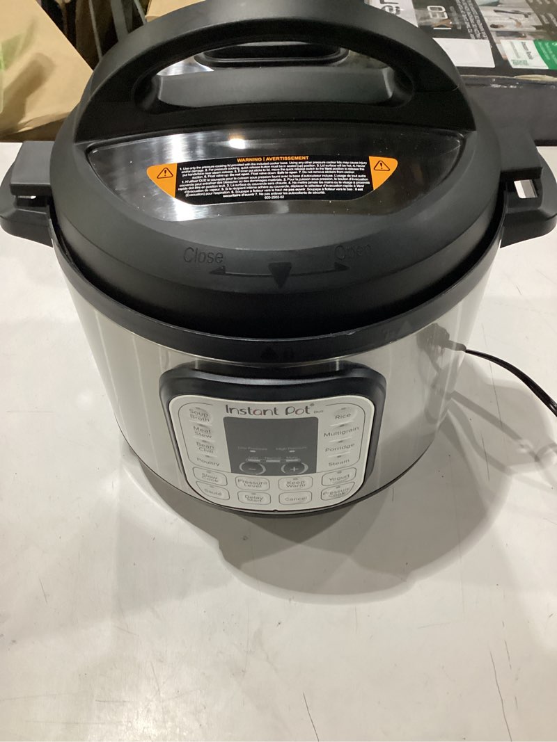 Condition photo showing As Is for **untested** instant pot duo 7-in-1 electric pressure cooker, slow cooker, rice cooker, steamer, sauté, yogurt maker, warmer & sterilizer, includes app with over 800 recipes, stainless steel, 8 quart