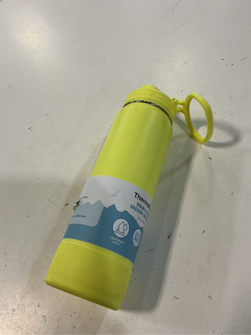 Condition photo showing Good Condition for thermoflask insulated water bottle with spout lid (24 oz, unmellow yellow) - leakproof, stainless steel water bottle for cold & hot drinks, travel & daily hydration 24 ounces unmellow yellow 1