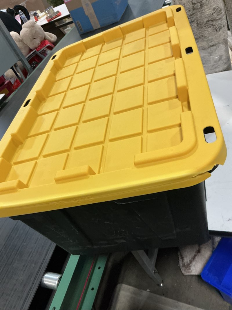 Condition photo showing Good Condition for (similar )17 gal. flip top storage tote in black and yellow
