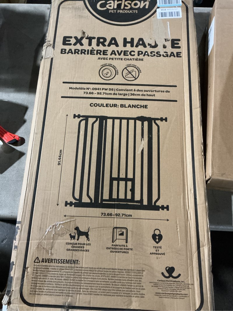 Condition photo showing Good Condition for Carlson Extra Tall Walk Through Pet Gate with Small Pet Door, Includes 4-Inch Extension Kit, 4 Pack Pressure Mount Kit and 4 Pack Wall Mount Kit
