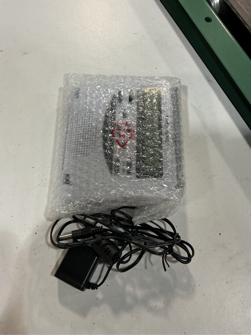 Condition photo showing As Is for midland white noaa weather alert radios digital battery operated