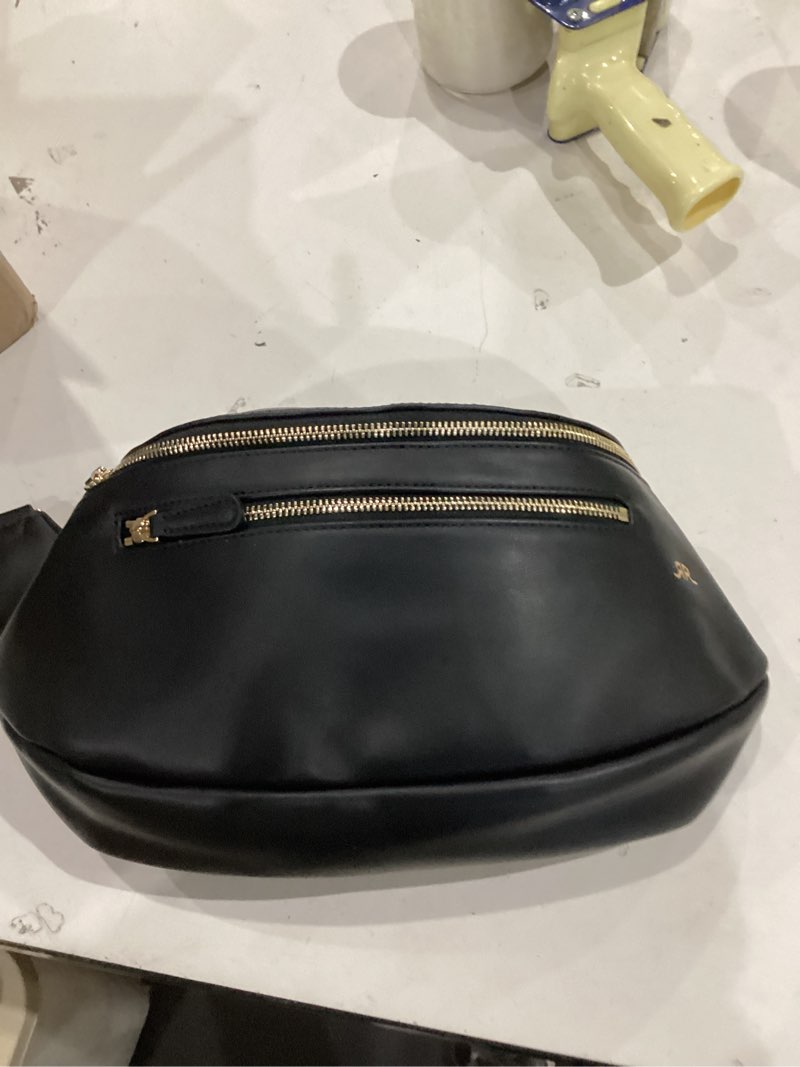 Condition photo showing Good Condition for the sidekick camera bag – compact, vegan leather, hands-free crossbody with protective suede interior, black