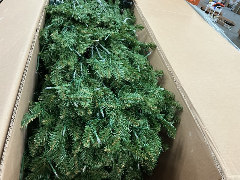 Condition photo showing As Is for National Tree Company 10 ft Pre-Lit Dunhill Fir Full Artificial Christmas Tree, 1,200 LED Lights, 5,090 Tips, Foot Pedal, 10 Light Functions, Includes Stand, Green 10ft Tree
