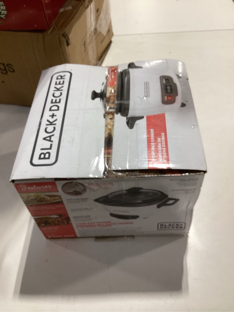 Condition photo showing As Is for BLACK+DECKER 3-Cup Rice Cooker, RC503, 1.5-cup Uncooked Rice, Steaming Basket, Removable Non-Stick Bowl, One Touch, White