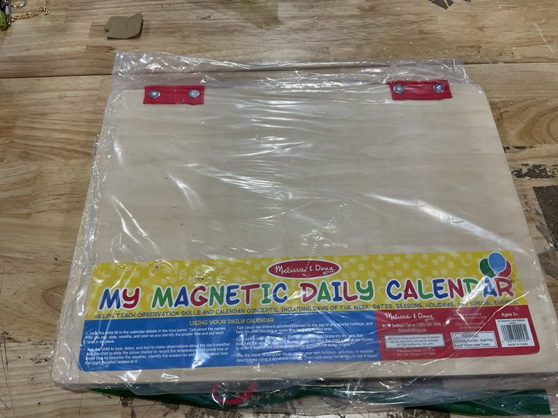 Condition photo showing As Is for melissa & doug my first daily magnetic calendar