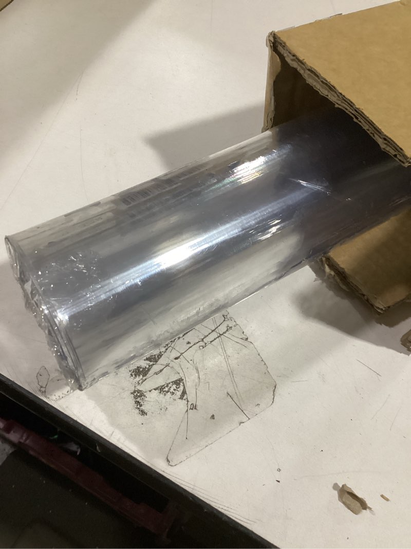 Condition photo showing Good Condition for OstepDecor Clear Table Cover Protector 36 x 60 Inch, 2mm Thick Plastic Table Protector for Dining Room Table, Waterproof & Wipe Clean Mat Pad for Kitchen 36" x 60" (Rectangular) Crystal Clear 2mm