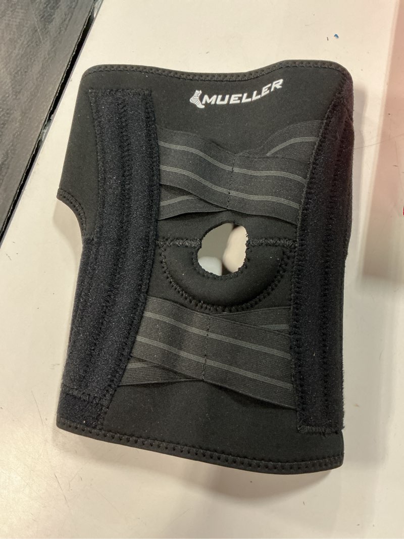 Condition photo showing Good Condition for mueller self adjusting knee stabilizer, black, one size fits most