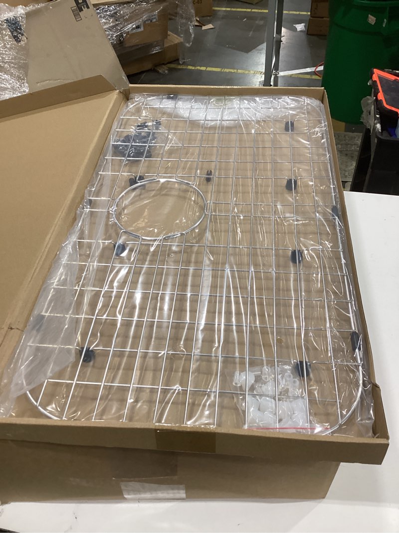 Condition photo showing As Is for Serene Valley Sink Protector Grid 26-1/16" x 14-1/16", Rear Drain with Corner Radius 3-1/2", 304 Stainless Steel Material NLW2614R