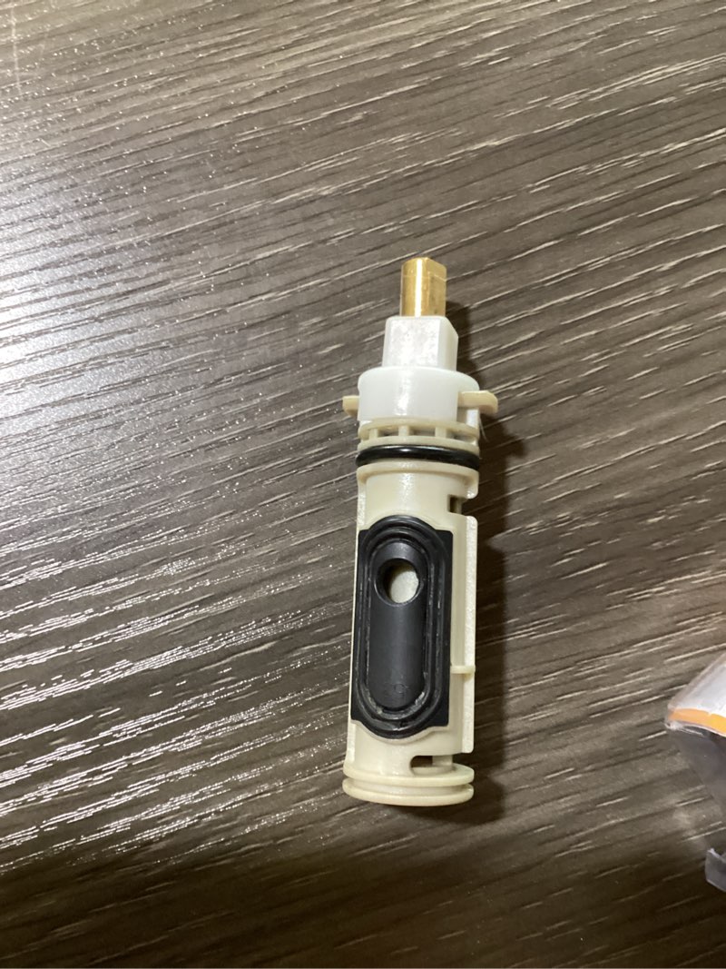 Condition photo showing As Is for danco 88675 replacement moen posi-temp cartridge  white