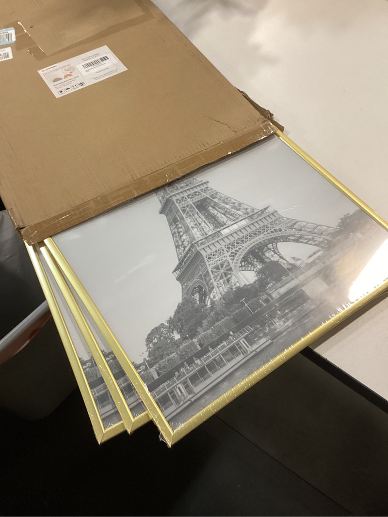 Condition photo showing New/Like New for upsimples 16x24 Picture Frame Gold 3 Pack, Scratch-Proof Poster Frames 16 x 24 for Photo Gallery - Slide-In Strips, Horizontal or Vertical Wall Mounting Gold 16x24