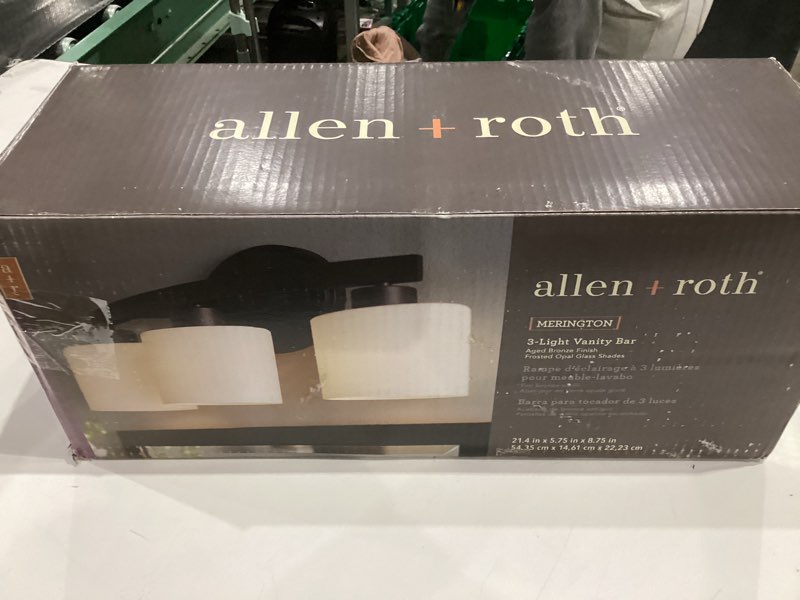 Condition photo showing As Is for allen + roth 3-light merington aged bronze bathroom vanity light