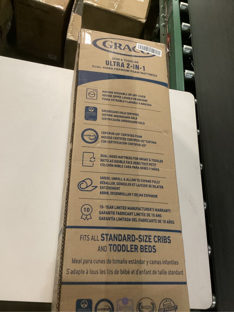 Condition photo showing New/Like New for Graco Premium Crib & Toddler Mattress – GREENGUARD Gold Certified, Machine-Washable OEKO-TEX STANDARD 100 Certified Cover with Waterproof Surface, Fits Any Standard Full Size Baby Crib & Toddler Bed similar to