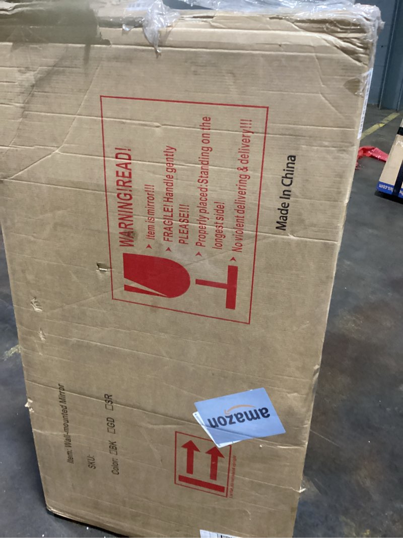 Condition photo showing As Is for Wall mounted mirror 