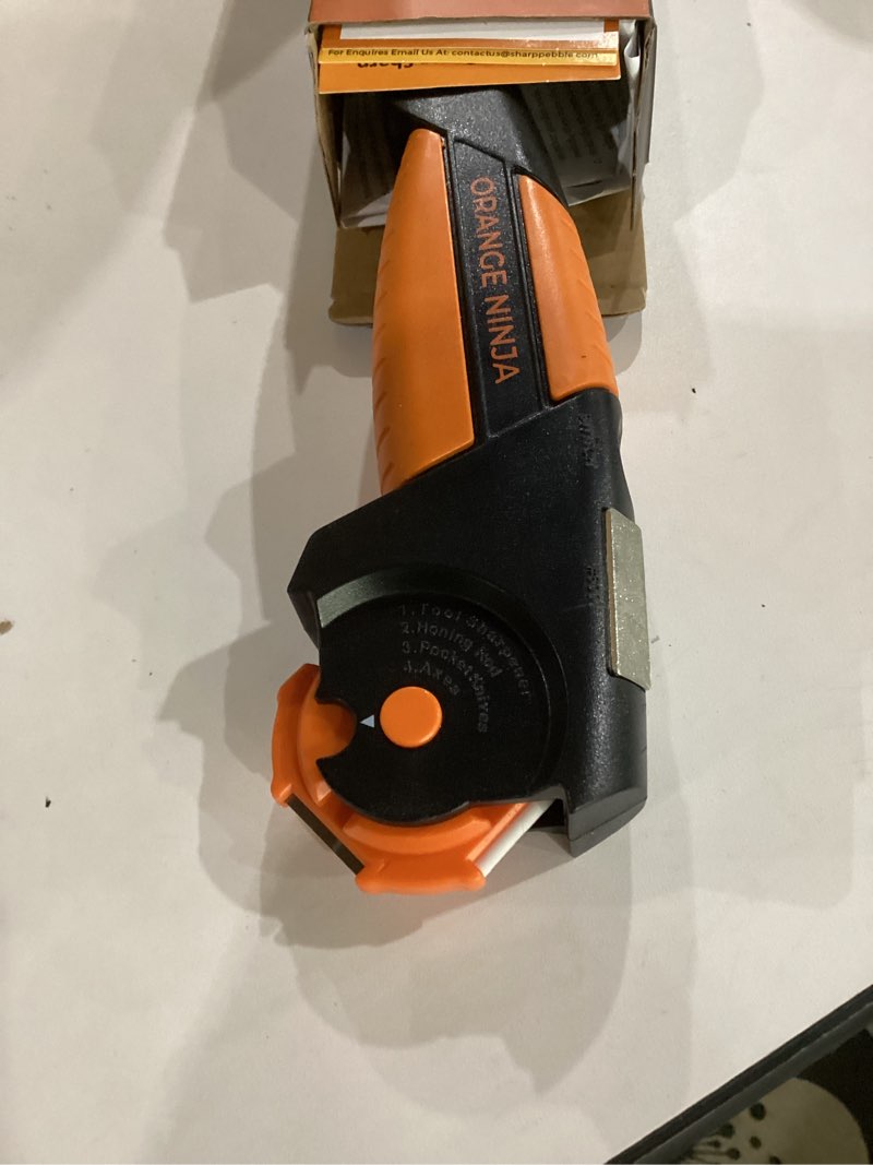 Condition photo showing Good Condition for orange ninja 7-in-1 garden tool & knife sharpener – sharpens axe, hatchet, machete, pruner & shears – one tool for all your outdoor blades – gift for gardeners