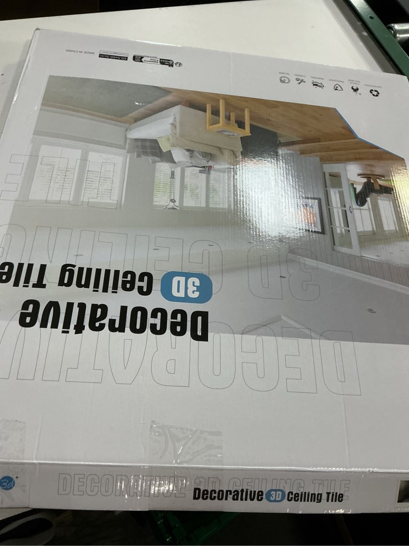 Condition photo showing New/Like New for Art3d 12-Pack 24x24 Inch PVC Waterproof Drop Ceiling Tiles for Home Décor - 2x2 ft 3D Modern Ceiling Panel for Suspended Grid, Black 24"x24" Black 12