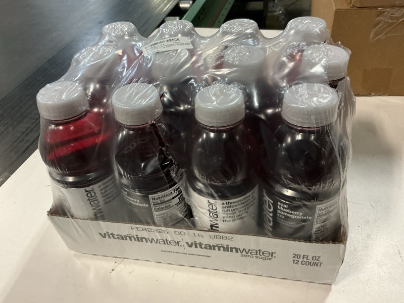 Condition photo showing New/Like New for (Best By Feb/23/2026) vitaminwater XXX Açai Blueberry Pomegranate Nutrient Enhanced Flavored Water Beverage, 20 fl oz Bottles, 12 Pack XXX Açai Blueberry Pomegranate 20 fl oz (Pack of 12)