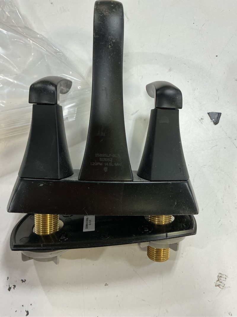 Condition photo showing As Is for delta arcadia matte black 4-in centerset 2-handle watersense mid-arc residential handle bathroom