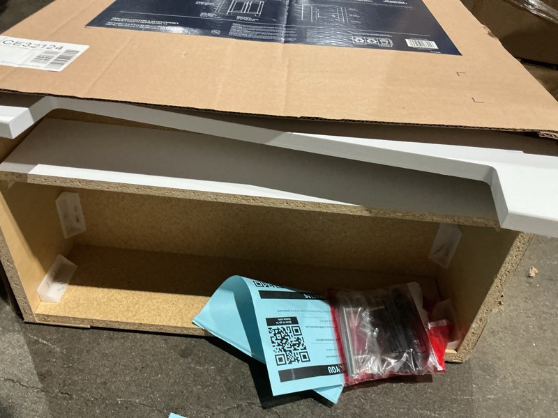 Condition photo showing As Is for  project source dover 24-in true white single sink bathroom vanity with white cultured