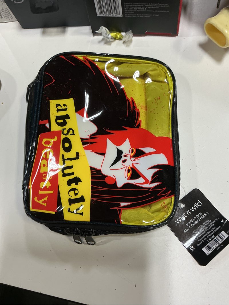 Condition photo showing Good Condition for wet n wild disney villains, cruella de vil makeup bag - absolutely beastly
