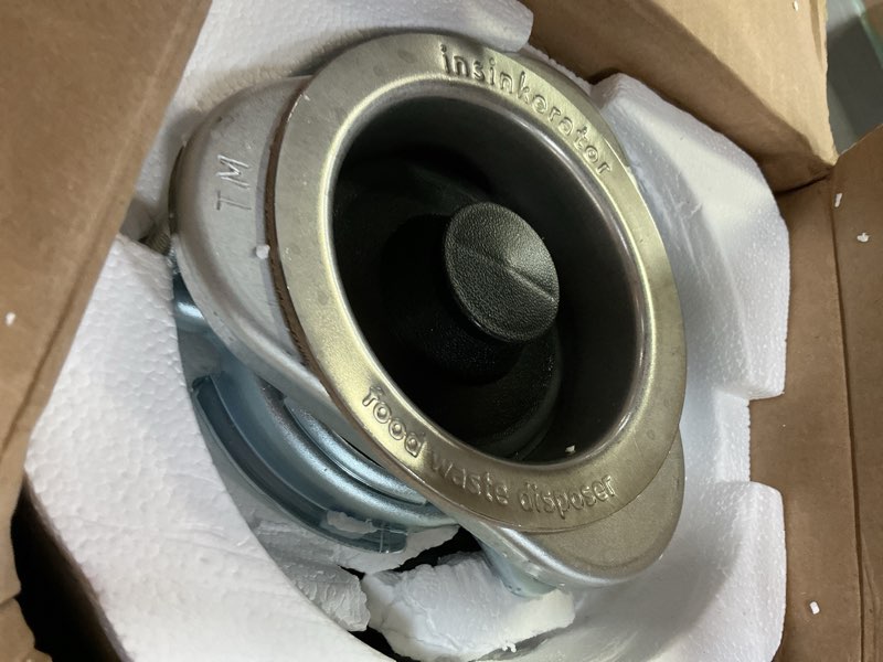 Condition photo showing As Is for insinkerator badger 5xp garbage disposal with power cord, standard series 3/4 hp continuous feed food waste disposer, badger 5xp w/c