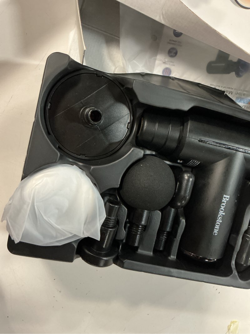 Condition photo showing As Is for brookstone cordless hot and cold percussion deep tissue massager gun, 6 intensity levels