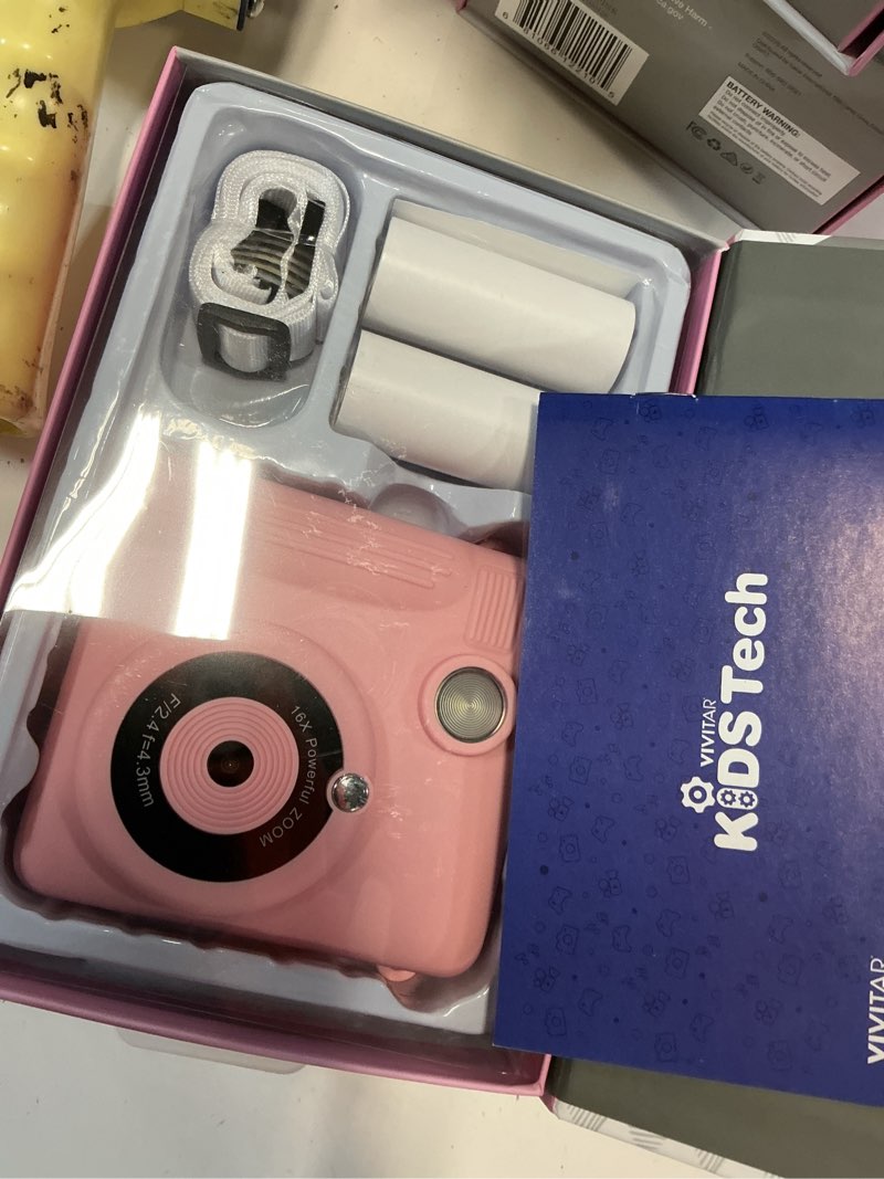 Condition photo showing Good Condition for vivitar instaprint digital camera, 12mp, 4 games, 2 rolls of paper, instantly prints 2" x 3" pictures -pink