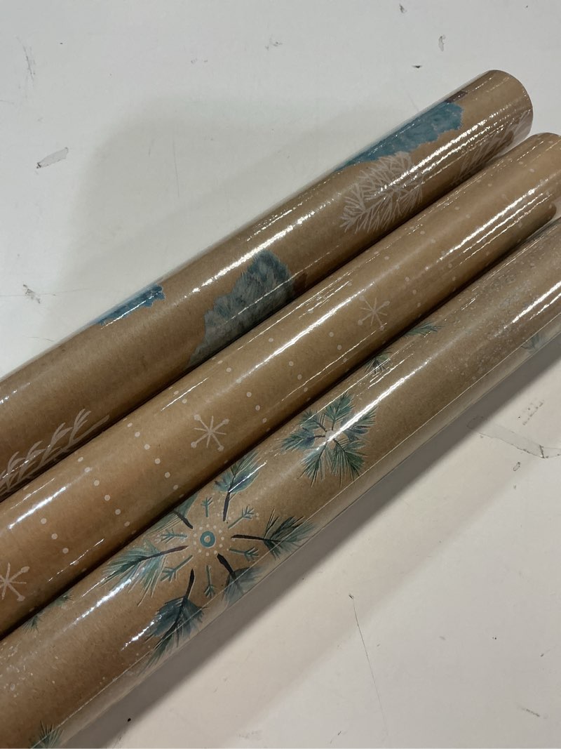 Condition photo showing Good Condition for Hallmark Christmas Wrapping Paper Rolls, Brown Kraft Snowflakes, Blue and Green Foliage, Trees Gift Wrap (Pack of 3: 90 sq. ft. ttl.) for Holiday Parties, Winter Weddings, Birthdays