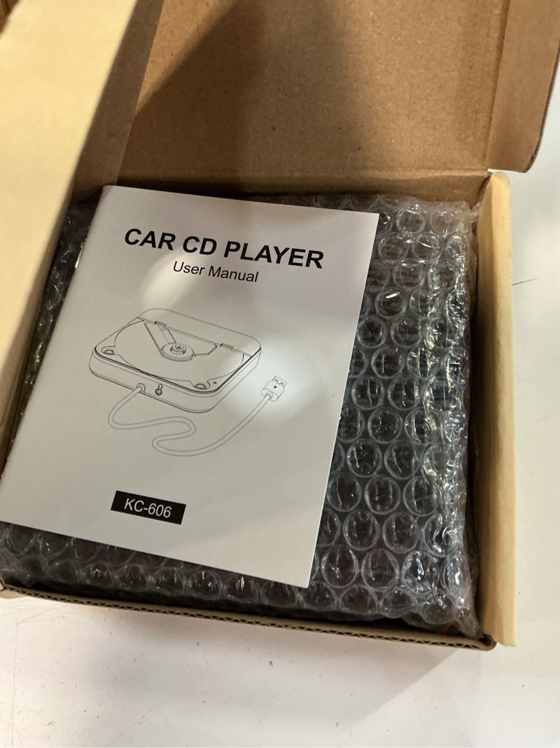 Condition photo showing New/Like New for jansion portable car cd player, plug & play cd player for car, anti-skip, usb & aux compatible, work