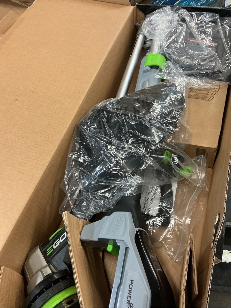 Condition photo showing As Is for ego powerload 56-volt 15-in telescopic shaft battery string trimmer 2.5 ah (battery and charger included)