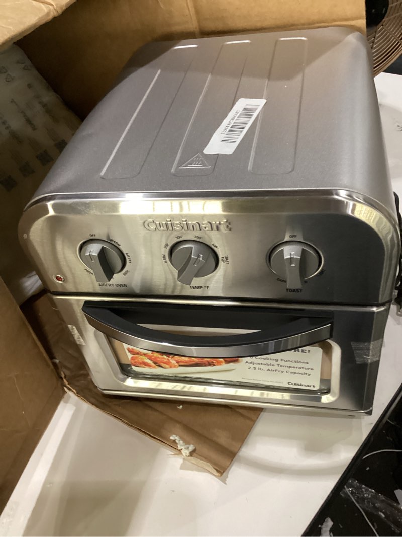 Condition photo showing As Is for cuisinart compact air fryer toaster oven, stainless steel fryer with 6-in-1 functions, adjustable temperature, includes oven rack, baking pan and air fry basket, toa-26 compact air fryer oven stainless steel, not tested, incomplete