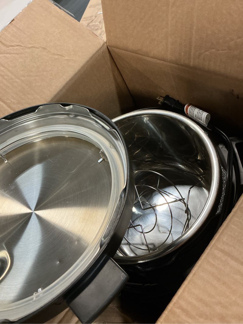 Condition photo showing As Is for cosori pressure cooker 6qt, stainless steel, 9-in-1 multi cooker, 12 safety features, ceramic inner pot, rice, slow cook, sous vide, saute, 1100w