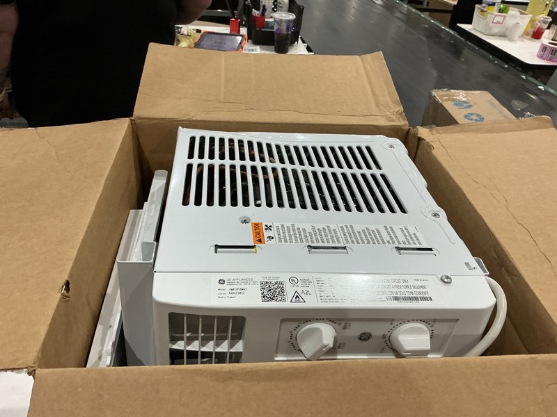 Condition photo showing As Is for ge window air conditioner unit, 5,000 btu for small rooms up to 150 sq ft. with manual adjustable fan and cooling settings, perfect for small bedroom or living room, easy install kit included, white new 5,000 btu mechanical controls white