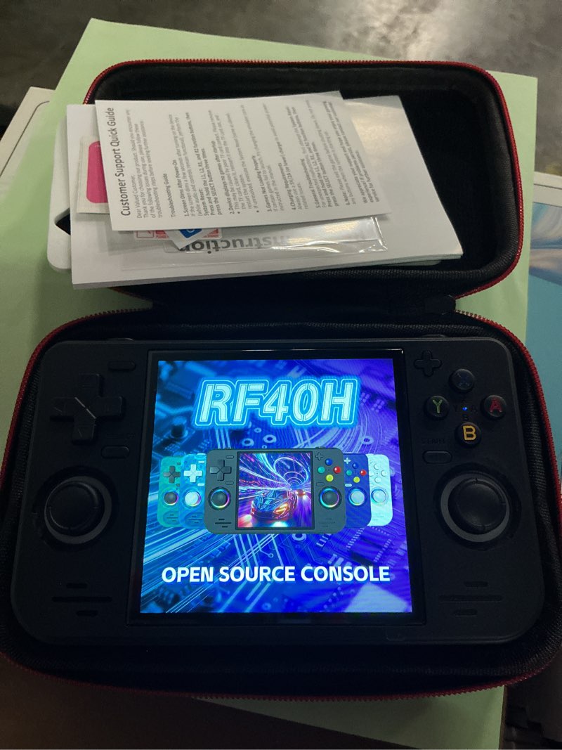 Condition photo showing Good Condition for rf40h handheld game console, 4.0" retro gaming console preloaded 20,000+ classic games, open source linux system, support wifi online play, portable pocket hand held video game (purple)
