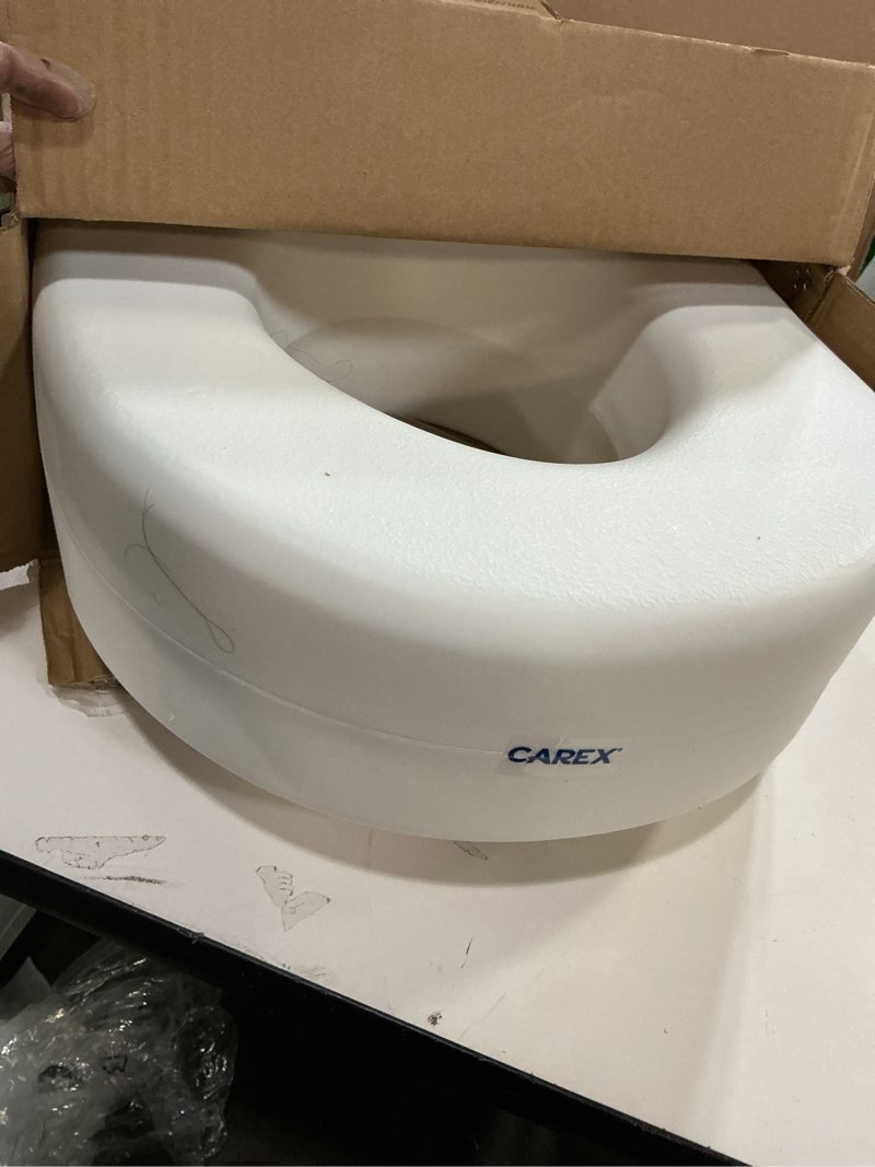 Condition photo showing As Is for Carex Toilet Seat Riser, Adds 5 Inches of Height, Elevated and Raised Toilet Seat with 300 lbs Capacity, Standard Riser for Elderly and Handicap, Universal, Slip-Resistant, White 5 Inch (Pack of 1) Toilet Seat Riser