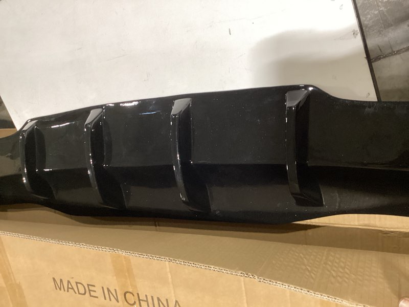 Condition photo showing Good Condition for rear diffuser for telsa model y without drilling, model y rear bumper molding protector lip made of pp material (glossy carbon fiber)