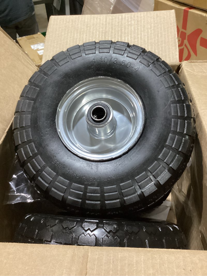 Condition photo showing Good Condition for ?upgraded?4.10/3.50-4 tire and wheel flat free, 10 inch solid rubber tire with 5/8”axle bore hole and double sealed bearings, for dolly wheels/hand truck wheels/dump cart?4 pack black