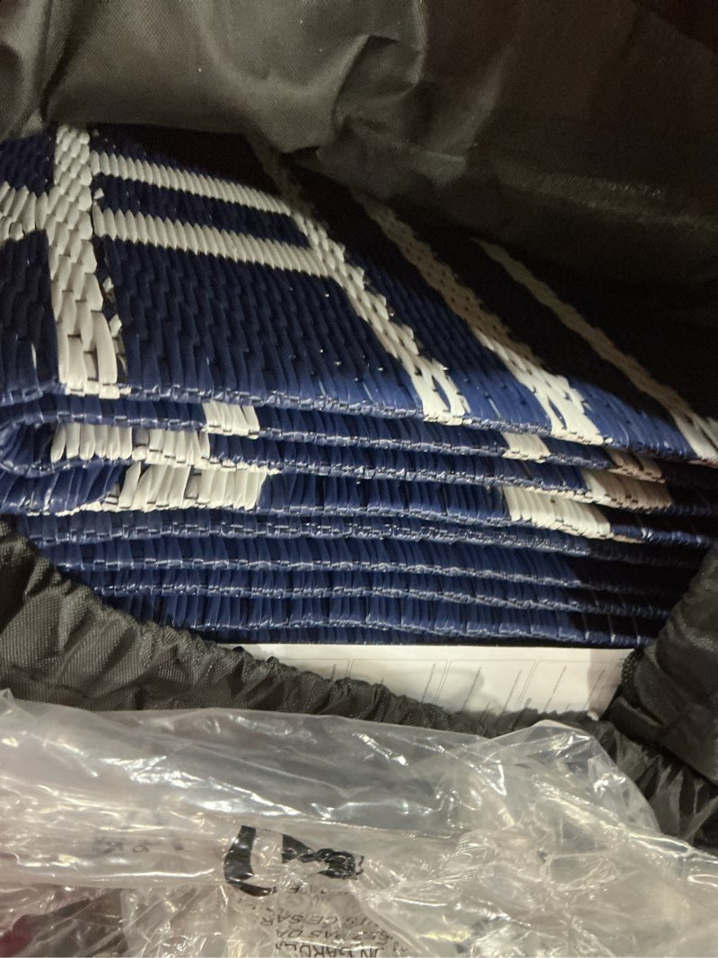 Condition photo showing New/Like New for genimo outdoor rug waterproof area 10'x14' for patio, foldable reversible plastic straw carpet for travel trailers, outside mat for rv, deck, picnic, porch, camper, balcony, beach, blue & white navy blue & white | natural 10' x 14' (rectangular)