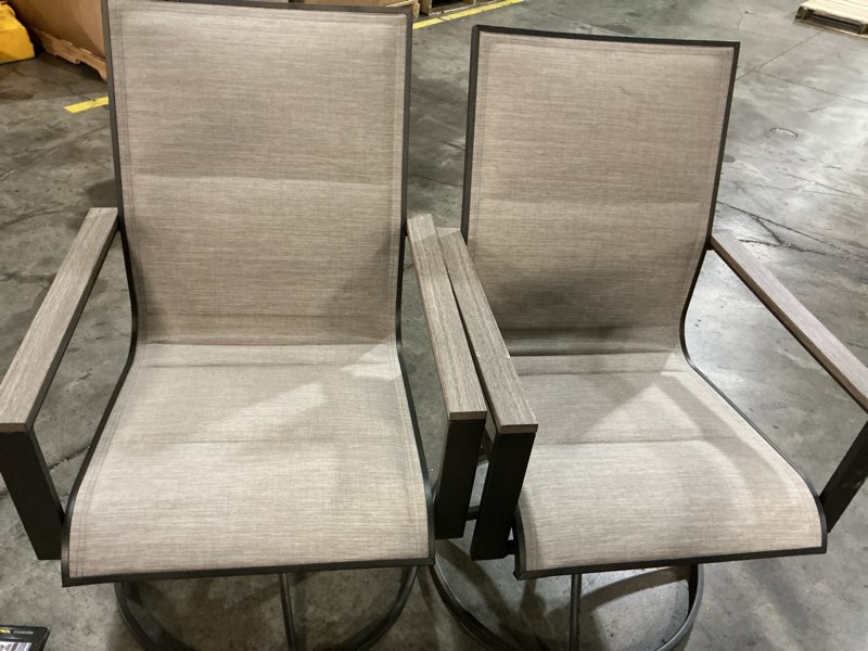 Condition photo showing As Is for style selections elmhurst set of 2 black steel frame swivel dining chair with gray sling seat