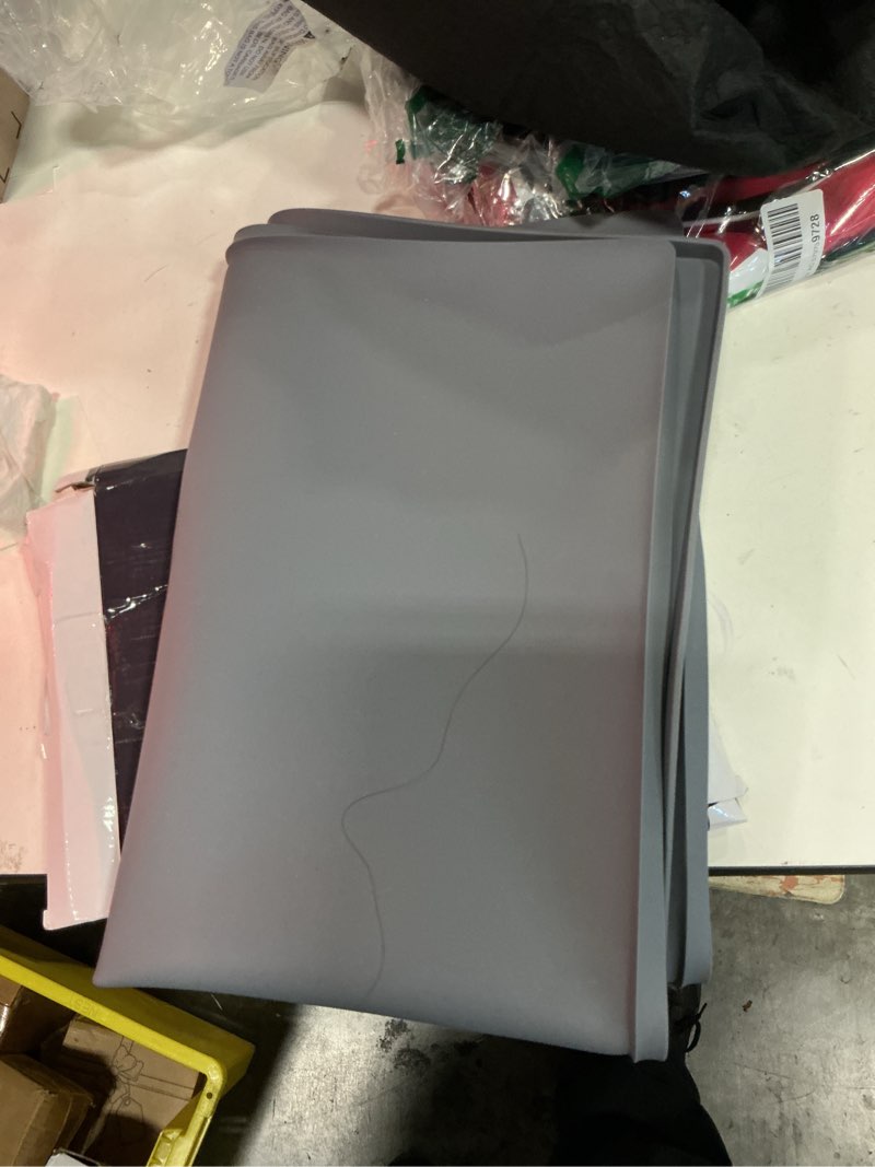 Condition photo showing Good Condition for 34" x 22" extra thick silicone mat waterproof with raised edge,