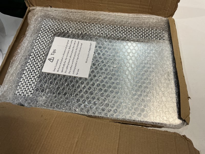 Condition photo showing New/Like New for titanium cutting board, 3 pcs titanium cutting boards for kitchen, non toxic, double-sided food grade chopping board for outdoor camping(15.6" x 11", 13" x 9.3", 11.8" x 7.8") 3 pack (15.6" x 11", 13" x 9.3", 11.8" x 7.8")