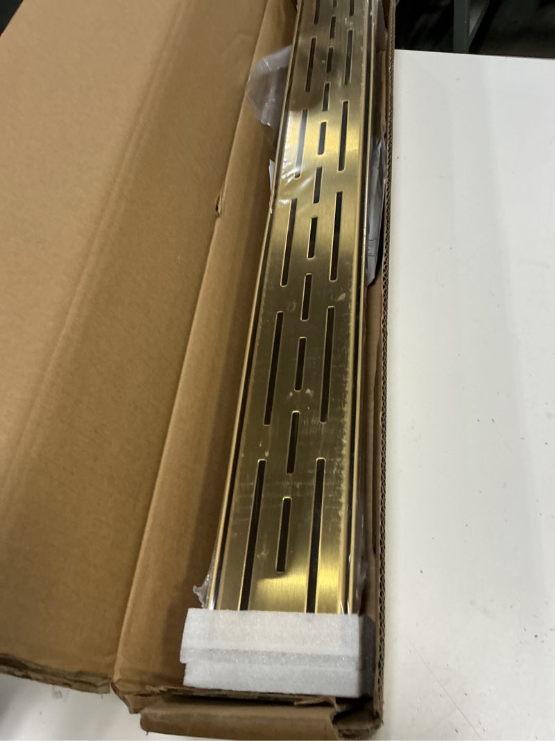 Condition photo showing New/Like New for brushed gold shower drain 24 inch, 304 stainless steel linear shower drain with removable brick pattern grate - adjustable rectangular shower floor drain with hair strainer, linear drain brushed gold 24 inch
