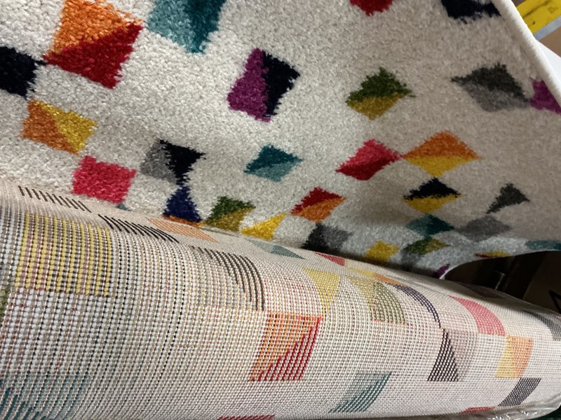 Condition photo showing Good Condition for nuLOOM Takisha Triangle Area Rug, 4' 1" x 6', Multi Color, Rectangular, 0.45" Thick