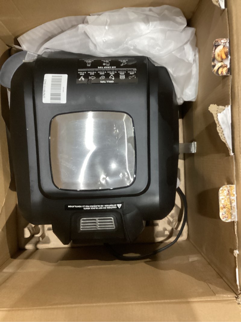 Condition photo showing As Is for ninja | indoor grill | foodi | 5-in-1 (grill, air fry, roast, bake, and dehydrate | fits up to 3lb roast | smoke control system and dishwasher safe parts| black/grey | ag301