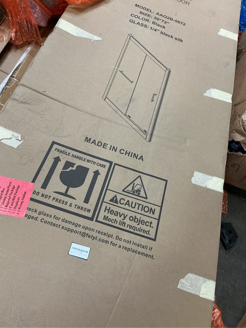 Condition photo showing Good Condition for 48-50" w x 72" h framed grid pattern single sliding shower door with 1/4" (6mm) clear sgcc tempered glass in matte black finish, reversible installation