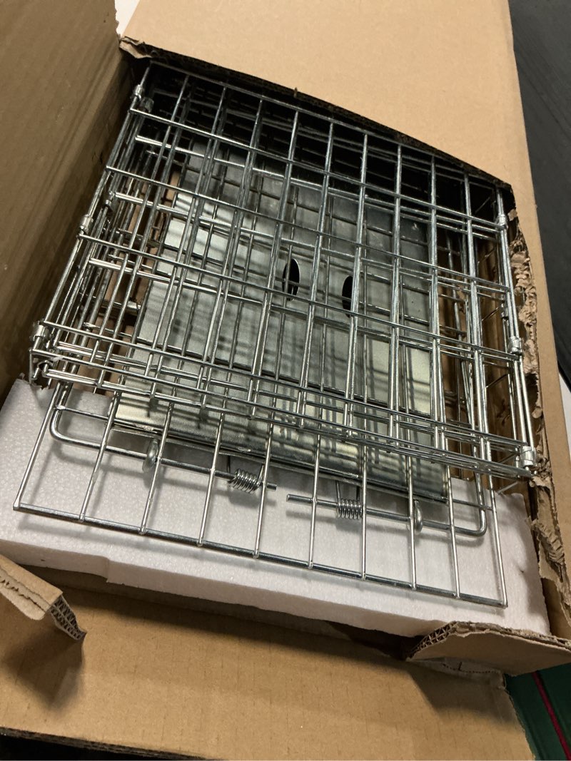 Condition photo showing As Is for SZHLUX 32" Live Animal Cage Trap, Heavy Duty Folding Raccoon Traps, Humane Cat Trap for Stray Cats, Raccoons, Squirrel, Skunk, Mole, Groundhog, Armadillo, Rabbit, Catch and Release SZ-HXL8130-NEW