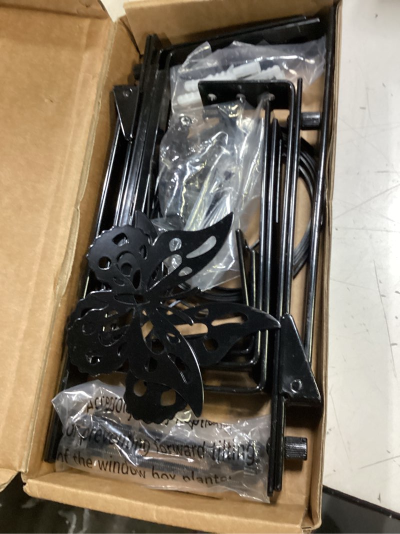Condition photo showing Good Condition for 2 pack window box brackets, adjustable planter box brackets, universal flower box bracket for deck railing, heavy duty railing planter bracket for balcony, fence and garden - black 2 pcs - black