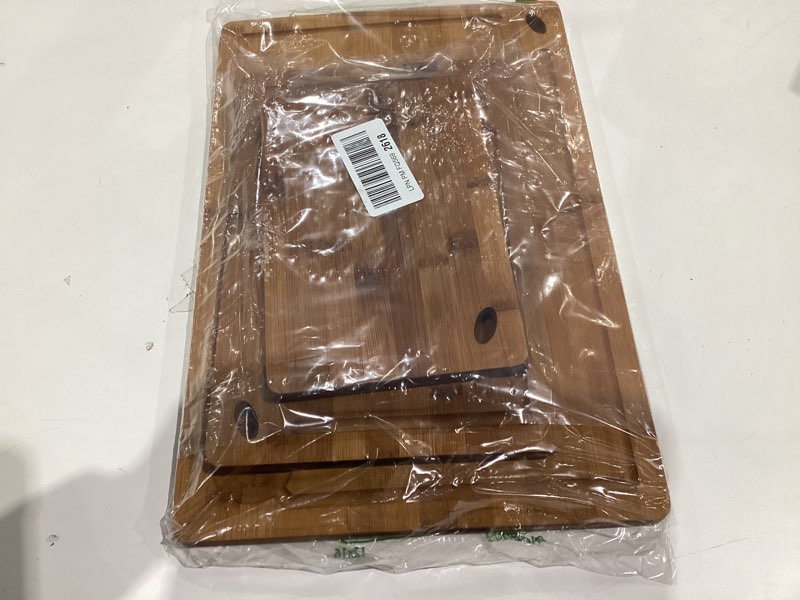 Condition photo showing Good Condition for pre-oiled, non toxic 3-piece carbonized bamboo cutting board set, eco-friendly wooden chopping boards for kitchen with hanging hole, 500°f carbonized technology charcuterie serving boards deer & oak 3-piece set