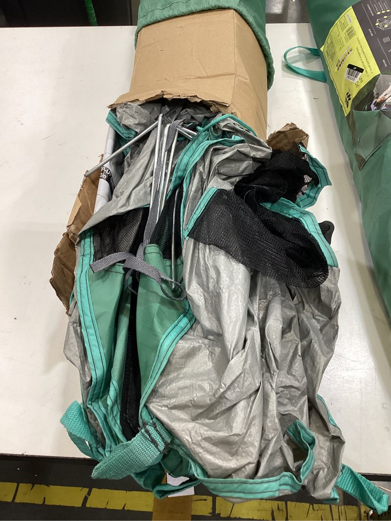 Condition photo showing As Is for 82.6''x70.8'' beach 4 person shelter green - all in motion™