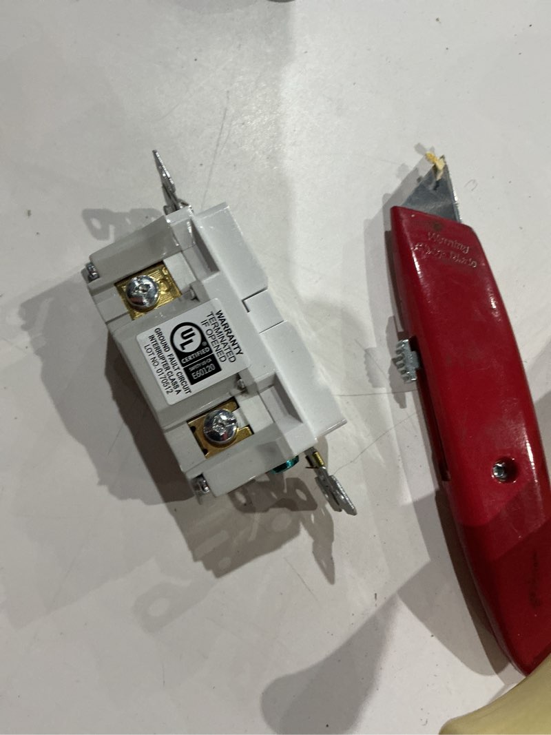 Condition photo showing As Is for eaton 20 -amp 125-volt tamper resistant weather resistant gfci residential decorator outlet