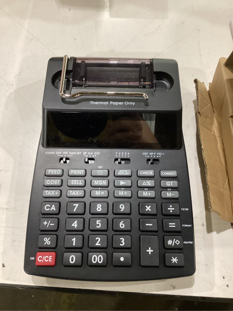 Condition photo showing Good Condition for amazon basics printing calculator with 12-digit lcd display, adding machine with thermal print out for business & tax, desktop and palm, black